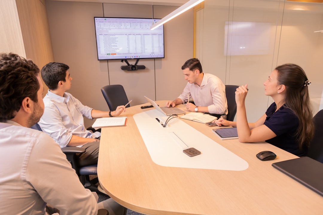 Team meeting discussing buyer matches